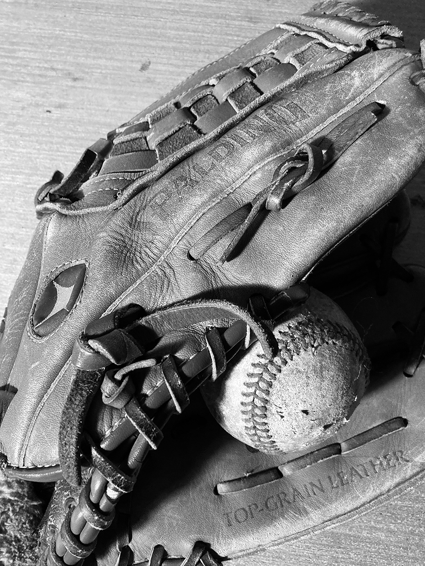 Photo reference of a baseball and glove