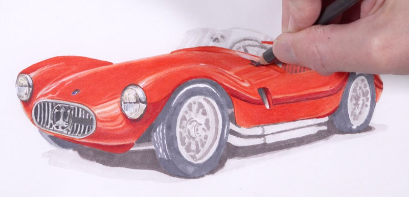 Applying colored pencils to the body of the car