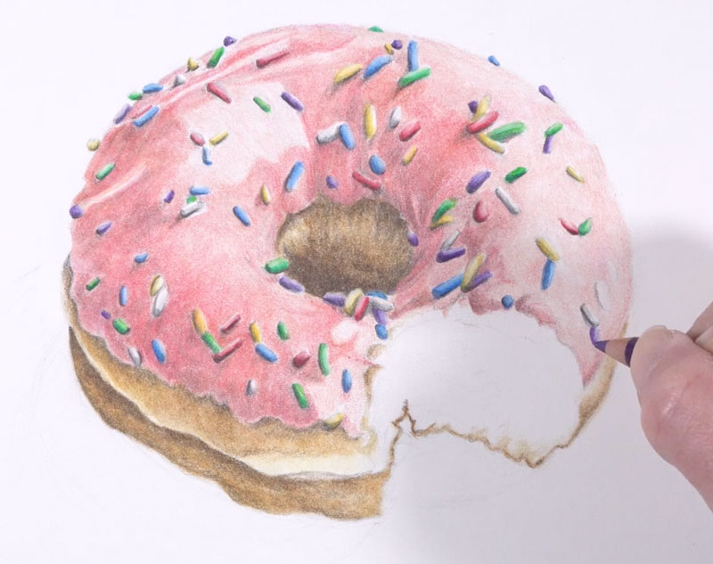 Drawing sprinkles on the doughnut