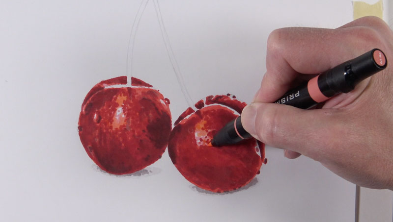 Adding lighter values on the drawing of cherries